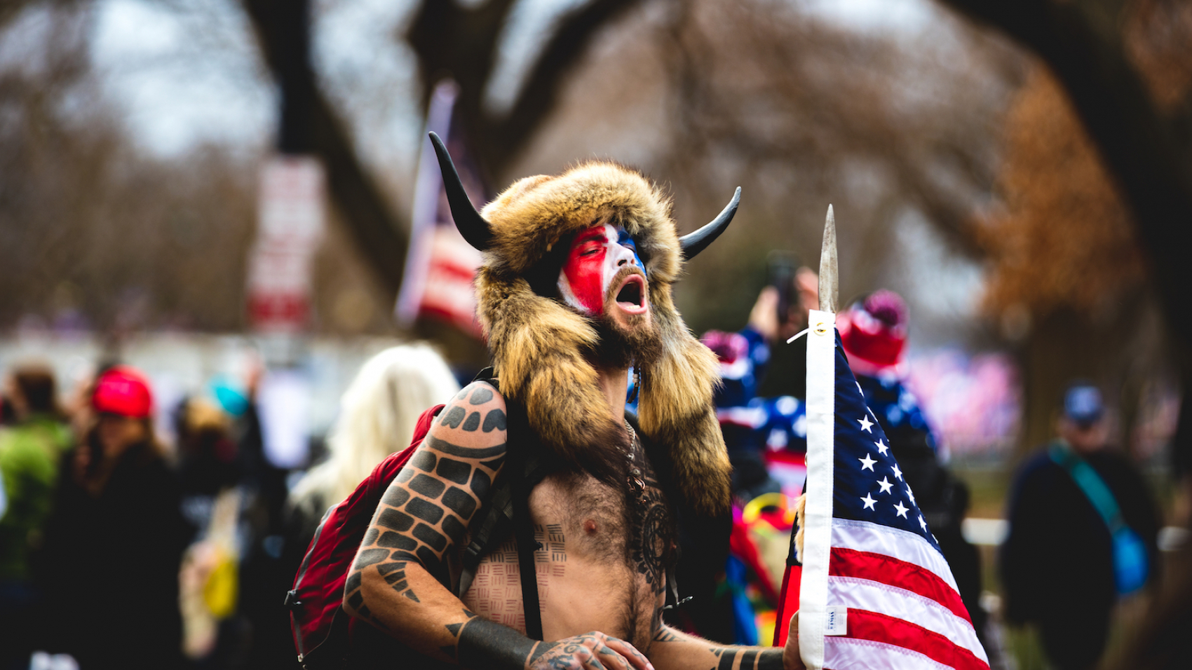QAnon Shaman, Jake Angeli is seen as roaming  near the US Capitol during the January 6, 2021 insurrection which was initiated by Former US President Donald Trump in Washington D.C.. Photo: Johnny Silvercloud
