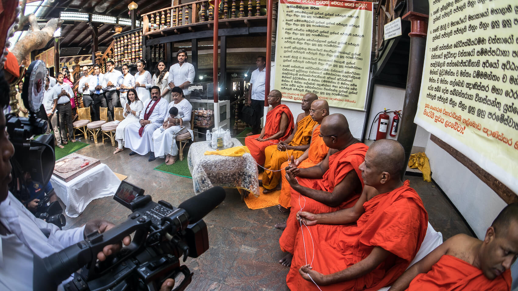 Former Sri Lankan President Mahinda Rajapaksa is seen with his wife and family in the Gangarama Temple at for religious ceremony and baptism in Colombo, Sri Lanka on January 28, 2020.