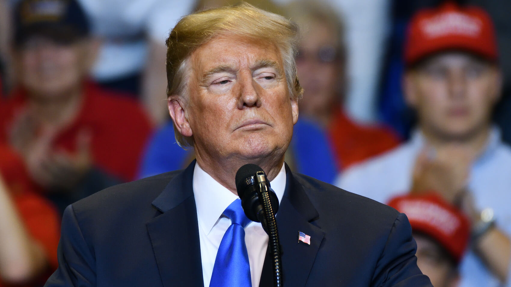 Former US President Donald Trump with a serious look as he delivers a speech at a campaign rally held at the Mohegan Sun Arena in Wilkes-Barre, PA - August 2, 2018. Photo: Evan El-Amin.