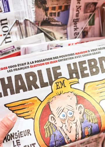 Charlie Hebdo is a French satirical weekly magazine, featuring cartoons, reports, polemics, and jokes.