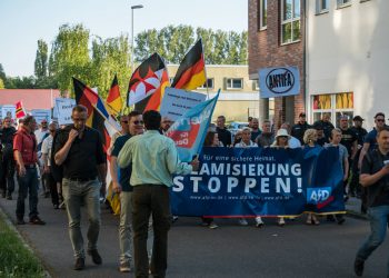 AfD demo with slogan Stop Islamization and counter demonstration of the Left in Luetten Klein in Rostock, Germany on May 14, 2018. AfD, Alternative for Germany, is a right wing political party in Germany. Photo: Shutterstock.