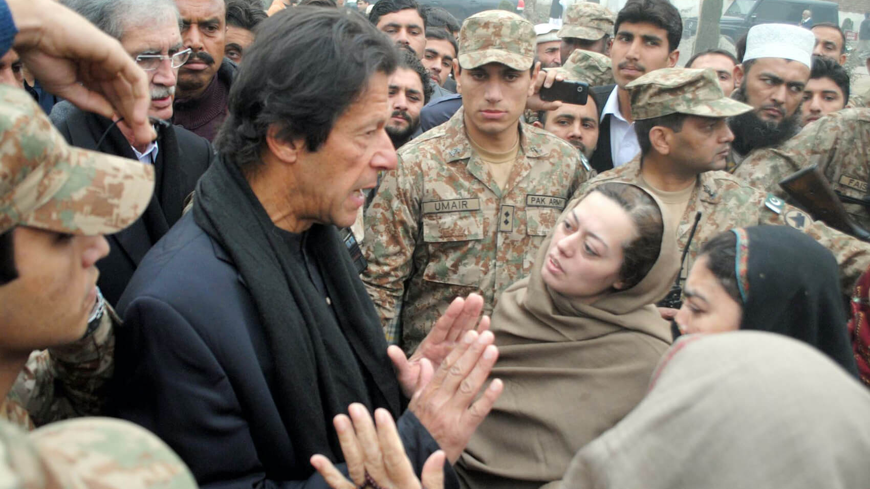 PTI Chairman, Imran Khan talking with parents of student who killed in Taliban attack on an Army Public School in Peshawar, Pakistan on December 22, 2014. Photo: Asianet-Pakistan.
