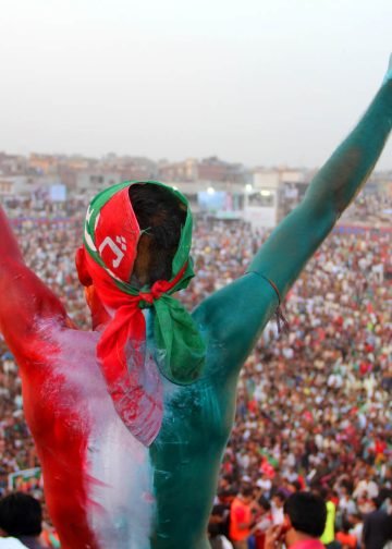 PTI supporter at Jinnah Cricket Stadium during a political rally of cricketer turned politician Imran Khan on March 23, 2012 in Sialkot, Pakistan. Photo: Jahanzaib Naiyyer.