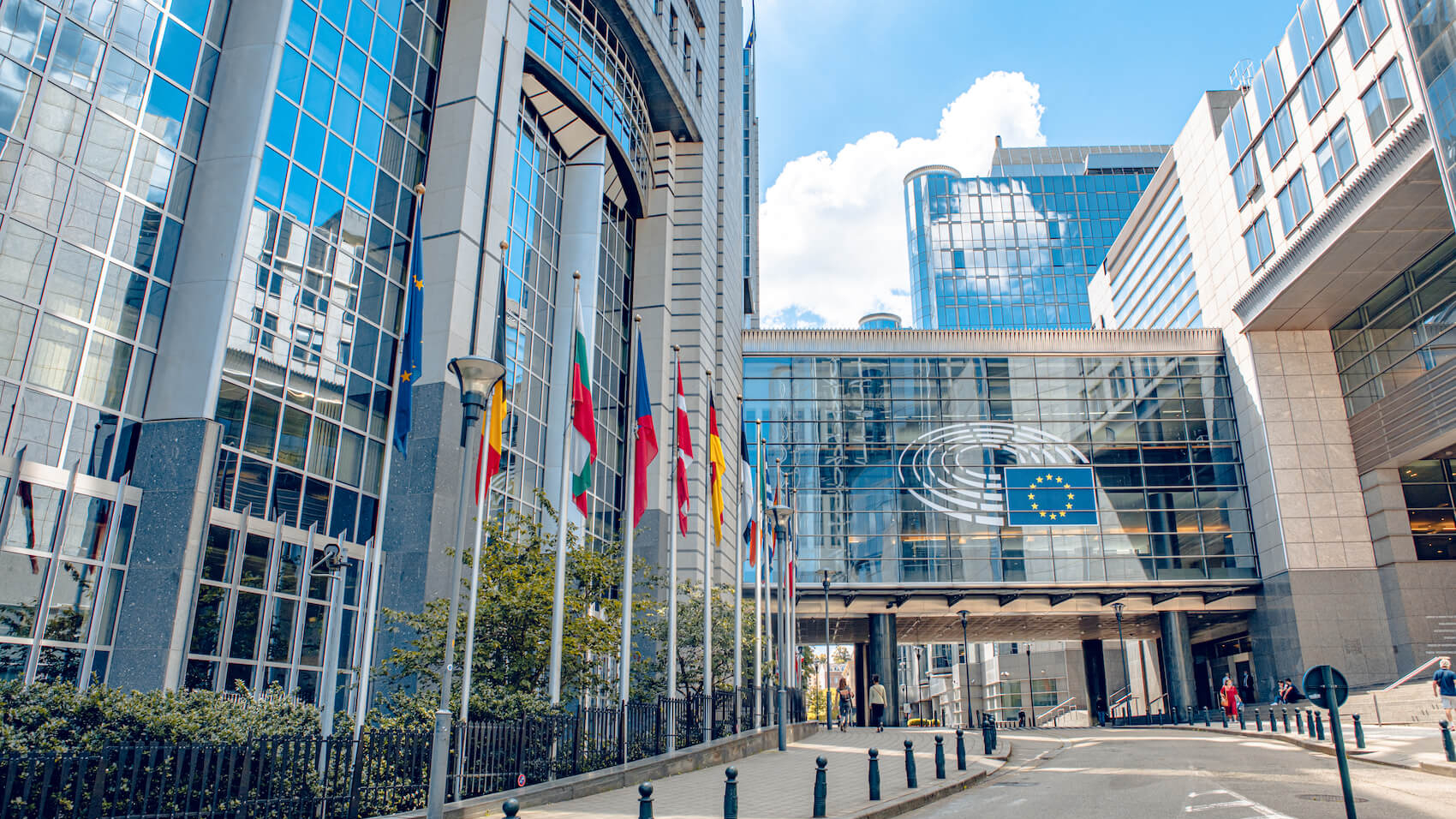 European Parliament offices and European flags in Brussels, Belgium on July 20, 2020. Photo: Lena Wurm.