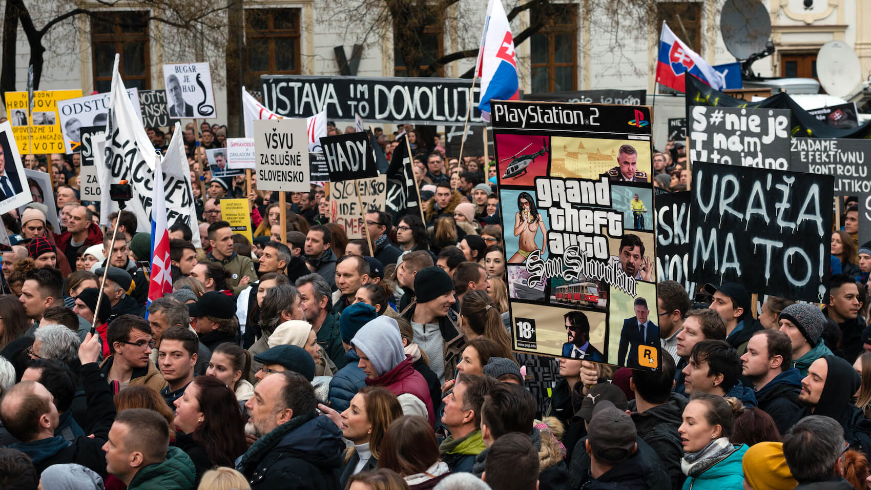 Protesters hold signs during an anti-government demonstration demanding a change in government in Bratislava, Slovakia on March 16, 2018. Photo: Ventura.