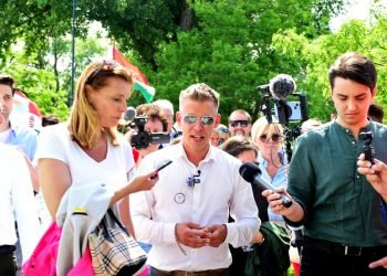Peter Magyar, a popular opposition politician of celebrity status meeting the press at the site of a soccer arena and miniature train station in Viktor Orban's village in Felcsut, Hungary. on May 24, 2024. Photo: Blue Corner Studio.