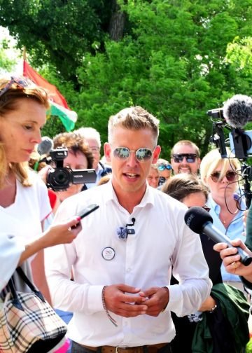 Peter Magyar, a popular opposition politician of celebrity status meeting the press at the site of a soccer arena and miniature train station in Viktor Orban's village in Felcsut, Hungary. on May 24, 2024. Photo: Blue Corner Studio.