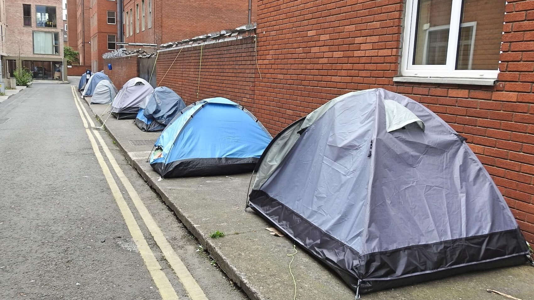 Figure 5: Asylum seekers' tents near the International Protection Office and Refugee Legal Service on Lower Mount Street, Dublin, Ireland, on July 7, 2023. Photo: Derick P. Hudson.