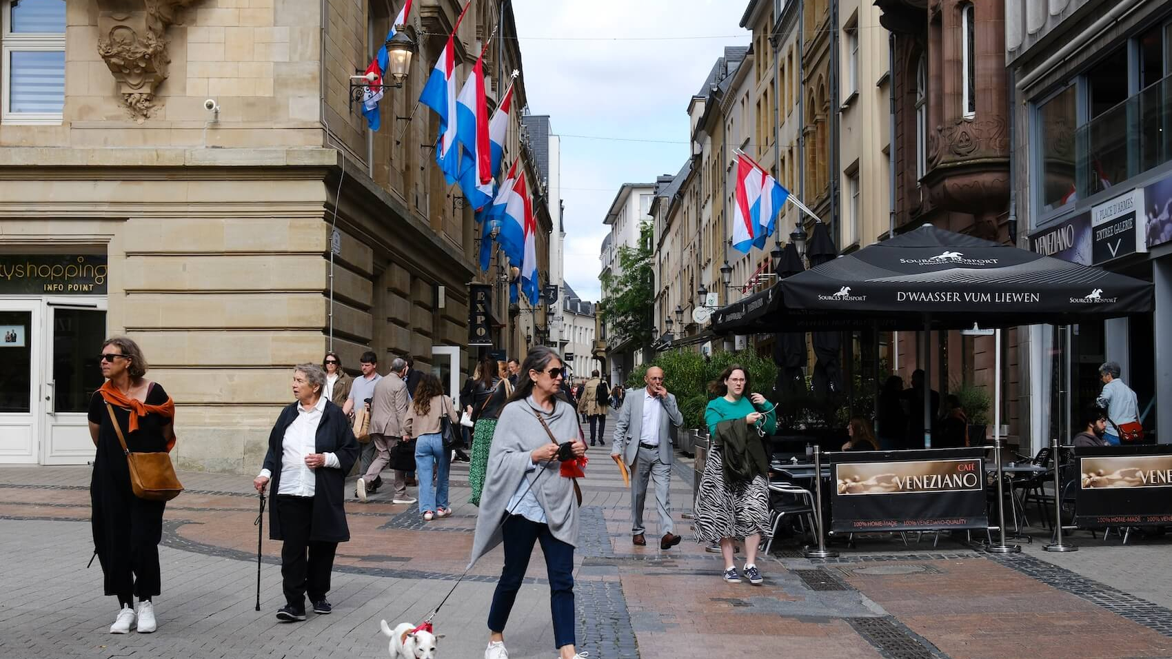 People walk in the center of Luxembourg City on June 19, 2024. Photo: Alexandros Michailidis.