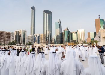 Emirati men perform the traditional Al Ayala dance in Abu Dhabi, UAE, on December 23, 2019. Photo: Shutterstock.