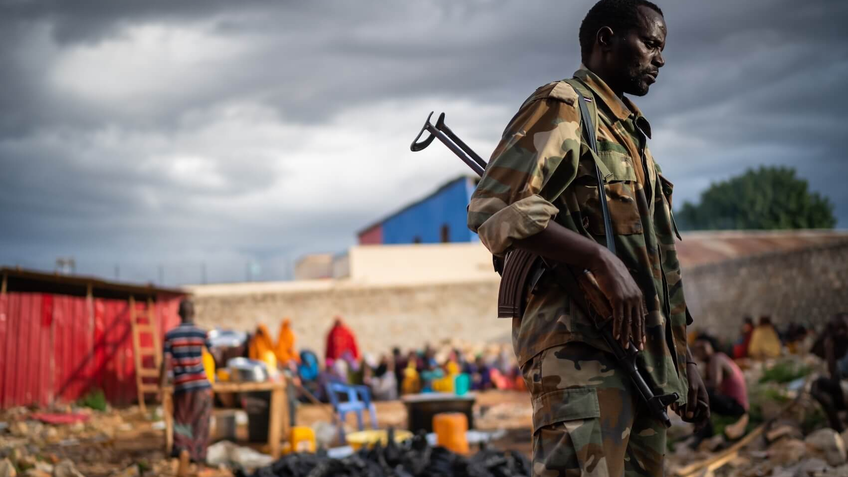 Soldier on duty to protect people during dinner in Baidoa, Somalia on May 15 2019. Photo: Shutterstock.