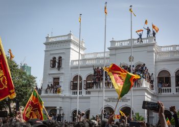 Sri Lankan protesters storm the prime minister's office in Colombo on July 13, 2022, demanding the resignation of President Gotabaya Rajapaksa and Prime Minister Ranil Wickremesinghe. Photo: Ruwan Walpola.