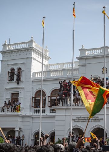 Sri Lankan protesters storm the prime minister's office in Colombo on July 13, 2022, demanding the resignation of President Gotabaya Rajapaksa and Prime Minister Ranil Wickremesinghe. Photo: Ruwan Walpola.