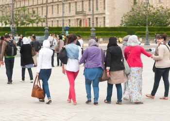Muslim women wearing hijabs walking on the streets of Paris, France, June 15, 2012. Photo: Shutterstock.