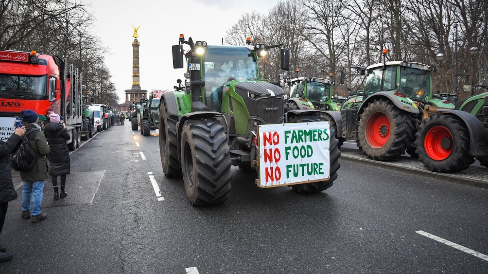 Farmers and truckers protest against subsidy cuts at the Brandenburg Gate in Berlin, Germany, on January 14, 2024. Photo: Shutterstock.
