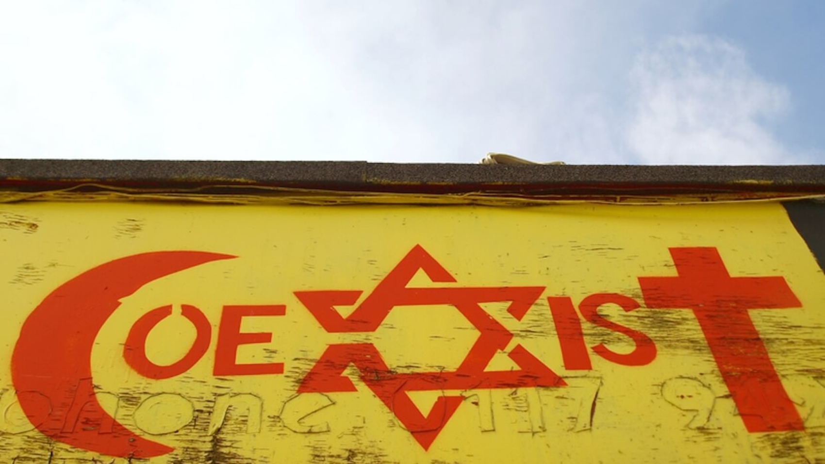 Graffiti artwork promoting religious tolerance, as Bristol City Council consulted the public on whether it should remain or be removed, August 31, 2009, Bristol, UK. Photo: Dreamstime.