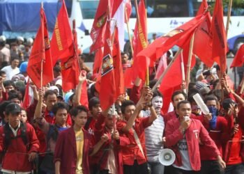 Activists stage an anti-corruption demonstration in Solo, Central Java, Indonesia. Photo: Dreamstime.