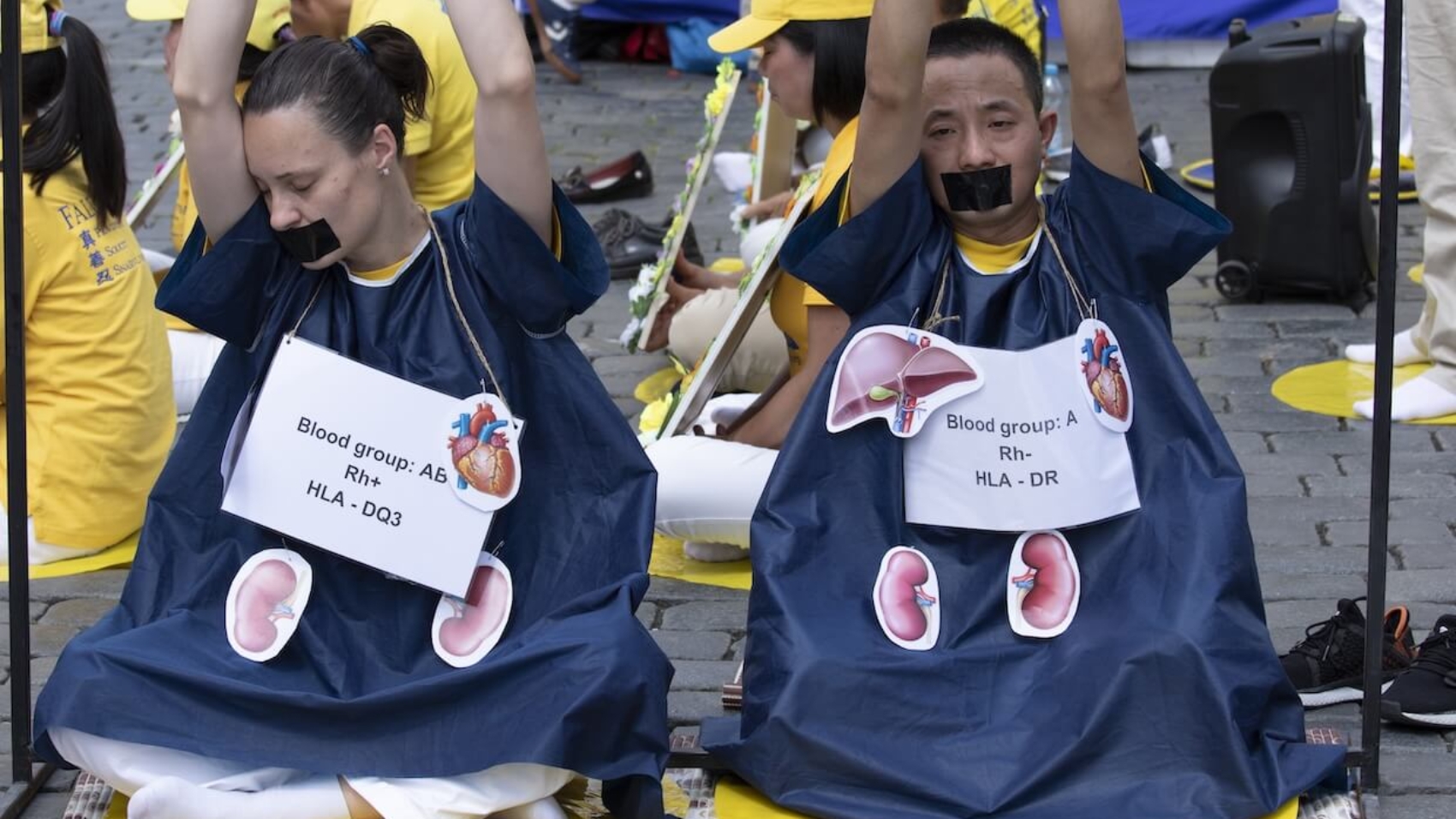 Falun Gong practitioners gather at Old Town Square in Prague, Czech Republic on July 20, 2019 to raise awareness about organ harvesting in China. Photo: Dreamstime.