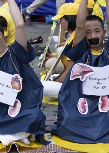 Falun Gong practitioners gather at Old Town Square in Prague, Czech Republic on July 20, 2019 to raise awareness about organ harvesting in China. Photo: Dreamstime.