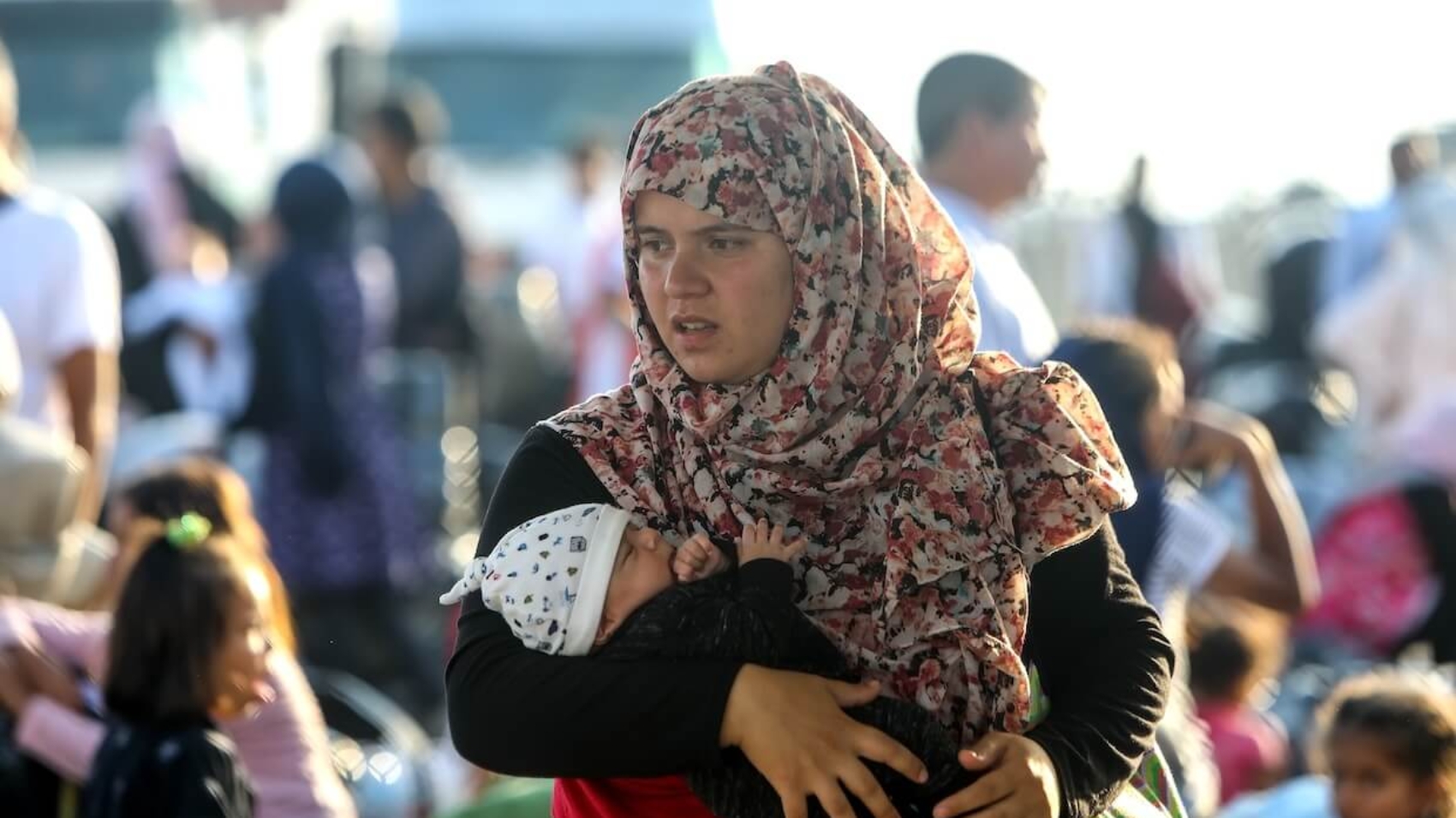 Refugees and migrants disembark at the port of Thessaloniki after being transferred from the Moria refugee camp on Lesvos Island, Greece, September 2, 2019. Photo: Vasilis Ververidis.
