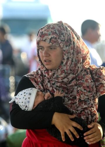 Refugees and migrants disembark at the port of Thessaloniki after being transferred from the Moria refugee camp on Lesvos Island, Greece, September 2, 2019. Photo: Vasilis Ververidis.