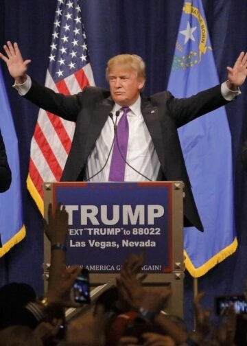 Donald Trump delivers a victory speech after his big win in the Nevada caucus at Treasure Island Hotel & Casino, flanked by his sons Eric (right) and Donald Jr. (left) in Las Vegas, NV. Photo: Joe Sohm.