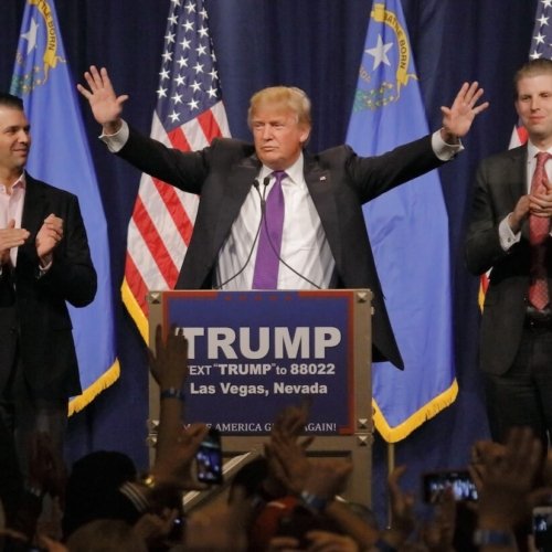 Donald Trump delivers a victory speech after his big win in the Nevada caucus at Treasure Island Hotel & Casino, flanked by his sons Eric (right) and Donald Jr. (left) in Las Vegas, NV. Photo: Joe Sohm.