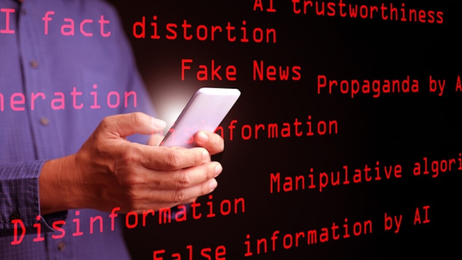 AI, artificial intelligence, and the concept of fake news, misinformation, and disinformation: A man uses his smartphone displaying the red text “Fake News,” surrounded by related keywords. Photo: Dreamstime.