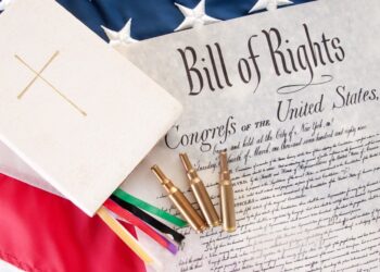United States Bill of Rights alongside a Bible and bullets. Photo: Cheryl Casey.