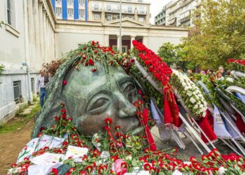 The Athens Polytechnic Monument covered with flowers during the 2019 commemoration of the 1973 student uprising against the Greek junta in Athens, Greece. Photo: Antonios Karvelas.
