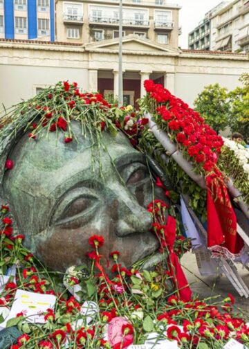 The Athens Polytechnic Monument covered with flowers during the 2019 commemoration of the 1973 student uprising against the Greek junta in Athens, Greece. Photo: Antonios Karvelas.