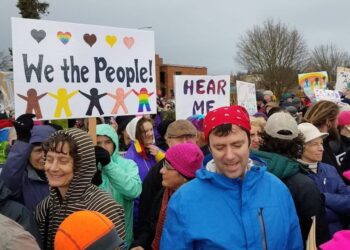 Women’s March Demonstration — Protesters take to the streets of Eugene, Oregon, despite the rain. Photo: Catherine Avilez.