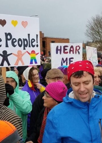 Women’s March Demonstration — Protesters take to the streets of Eugene, Oregon, despite the rain. Photo: Catherine Avilez.