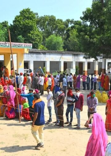 Voters queue at a polling station in Sendra village near Beawar during the Panchayati Raj elections in India on September 28, 2020, held amid the COVID-19 pandemic, with turnout exceeding 83 percent in the first phase across 25 districts. Photo: Dreamstime.