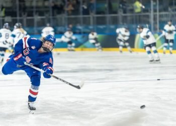 Ice Hockey Women’s Team USA warms up before its preliminary round Group B match against Finland at the Milano Ice Park in Rho, Milan, during the 2026 Milano–Cortina Winter Olympics. The United States defeated Finland 5–0. Photo:  Walter Arce | Dreamstime.