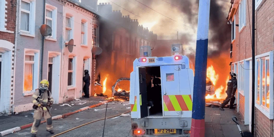 Residents flee burning homes in Belfast.