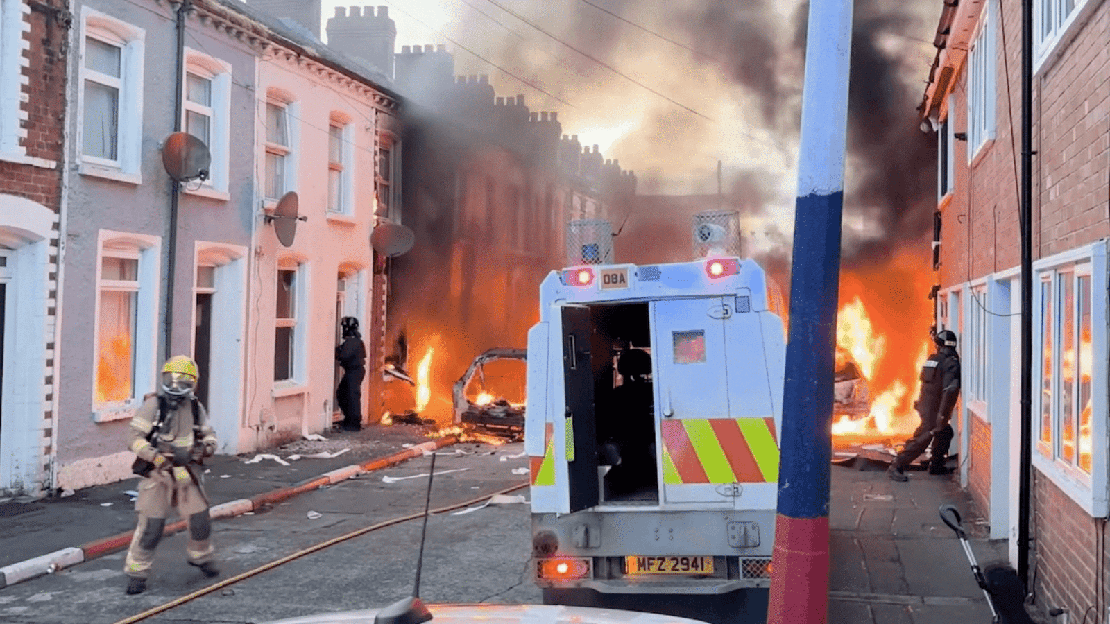 Residents flee burning homes in Belfast.