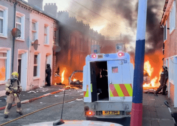 Residents flee burning homes in Belfast.