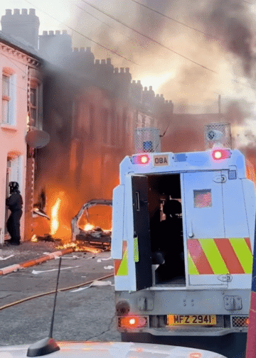 Residents flee burning homes in Belfast.