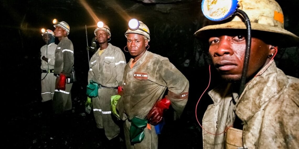 Underground platinum and palladium mining operations and machinery in Johannesburg.