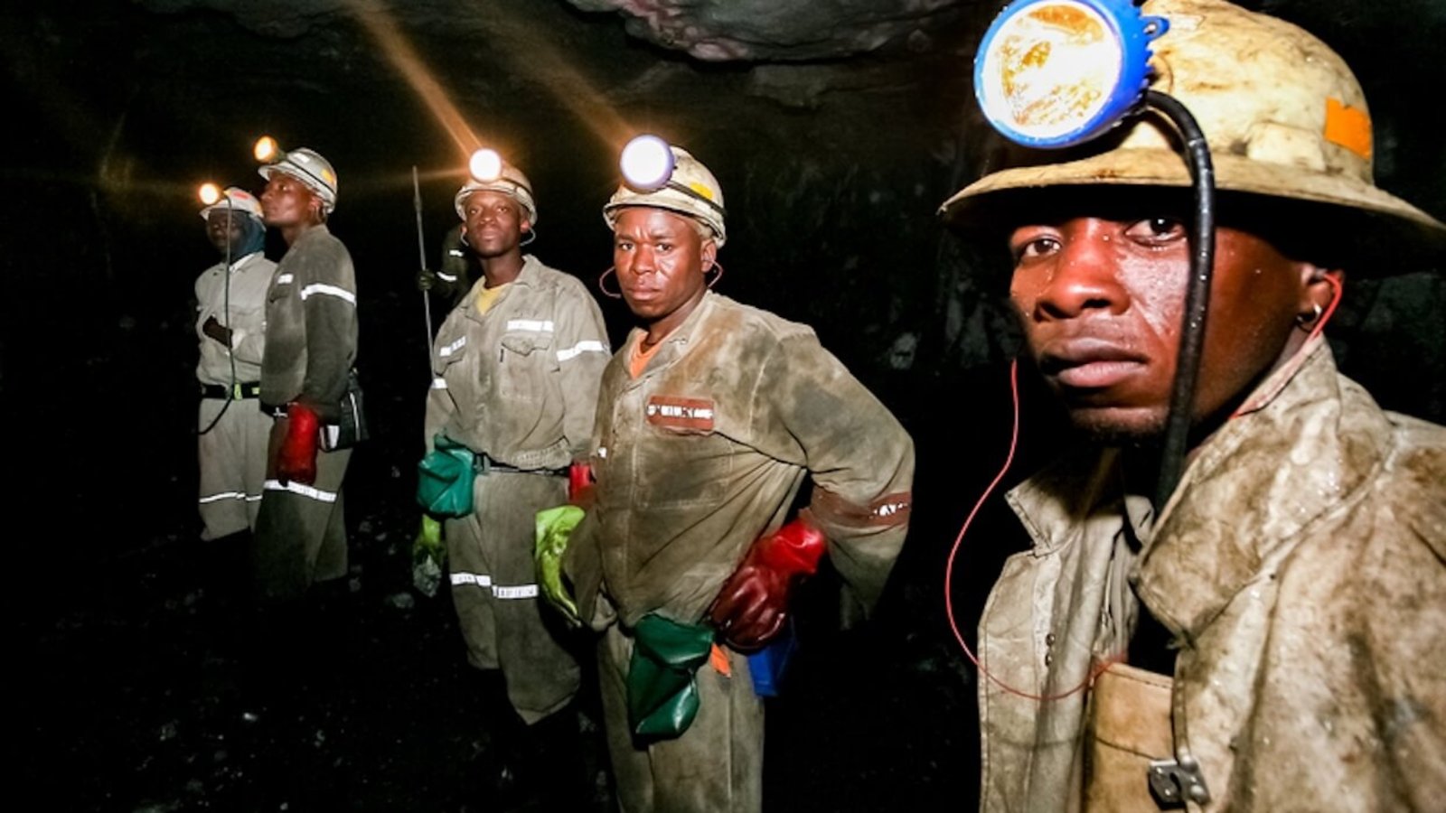 Underground platinum and palladium mining operations and machinery in Johannesburg.