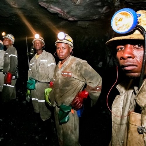 Underground platinum and palladium mining operations and machinery in Johannesburg.