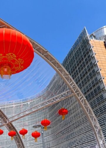 Chinese lanterns displayed during an event promoting cultural exchange and tourism between the EU and China near the European Commission building at Schuman Roundabout.