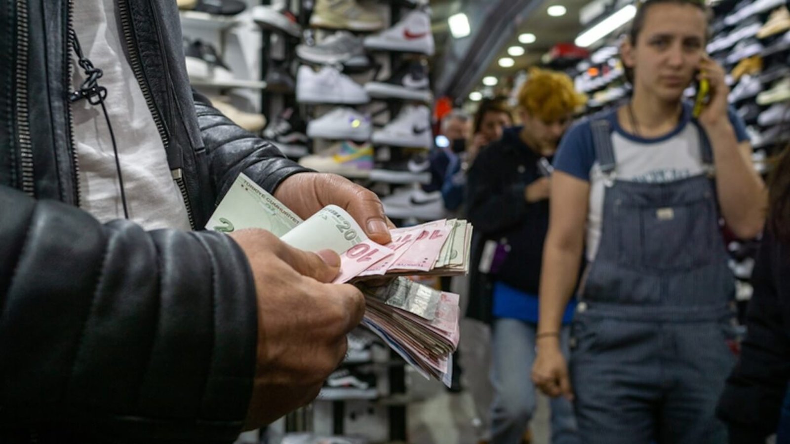 A man counts money.