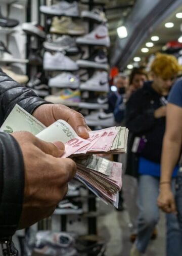 A man counts money.